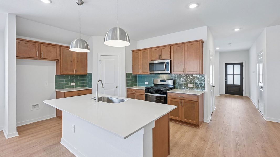 Furnished interior in a model home at Rosenbusch Ranch in Leander (Image 49).