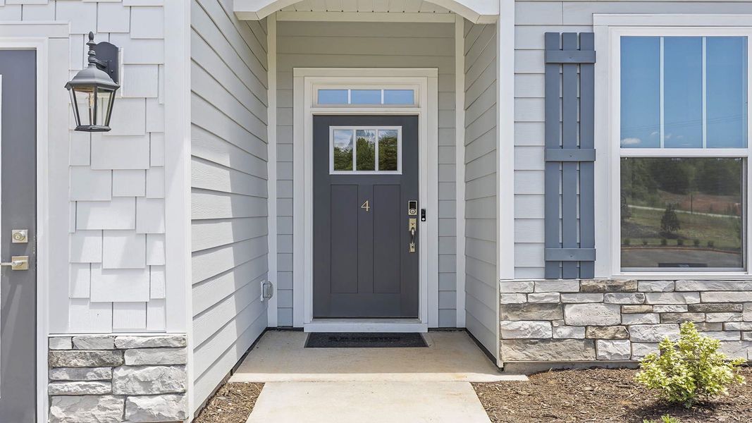 Front exterior of a home in the Whitehawk Meadows community, located in Travelers Rest, SC (Image 2).