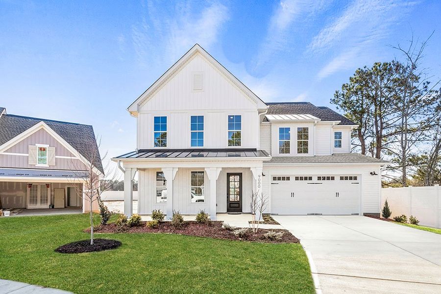 Front exterior of a home in the WyndWater community, located in Hampstead, NC (Image 12).