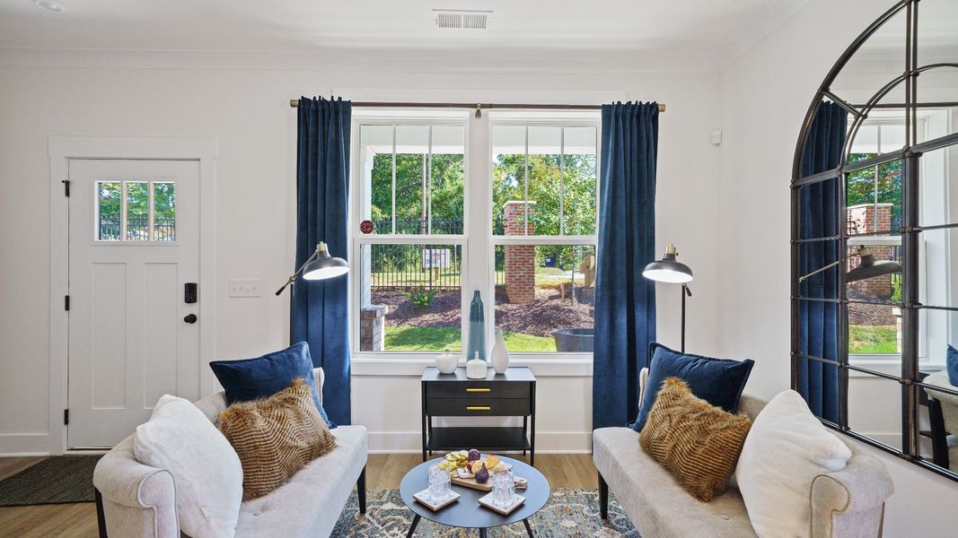 Furnished interior in a model home at Montgomery Chase in Greenville (Image 5).