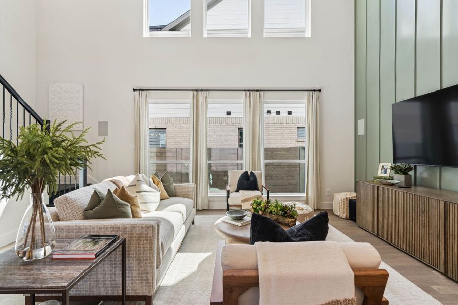Sunlit Living Room with Two-Story Ceilings in Ramble Sunlit Living Room with Two-Story Ceilings in Ramble