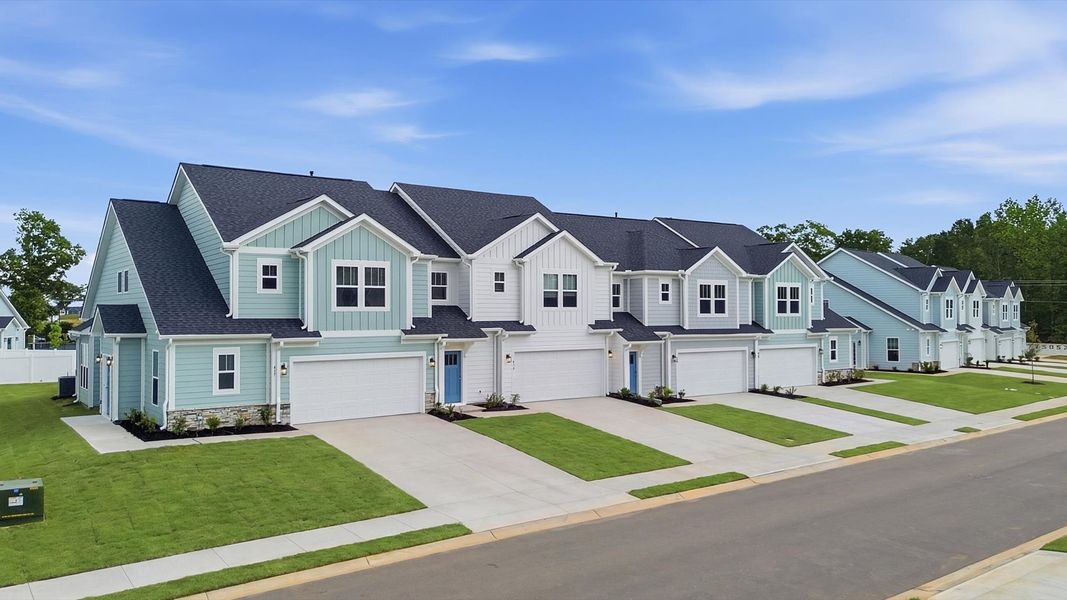 Front exterior of a home in the Barton Hollow Townhomes community, located in Fountain Inn, SC (Image 11). Front exterior of a home in the Barton Hollow Townhomes community, located in Fountain Inn, SC (Image 11).