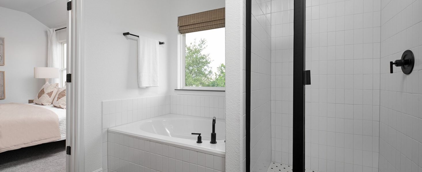 Furnished interior in a model home at Cannon Ranch 40s in Dripping Springs (Image 10).