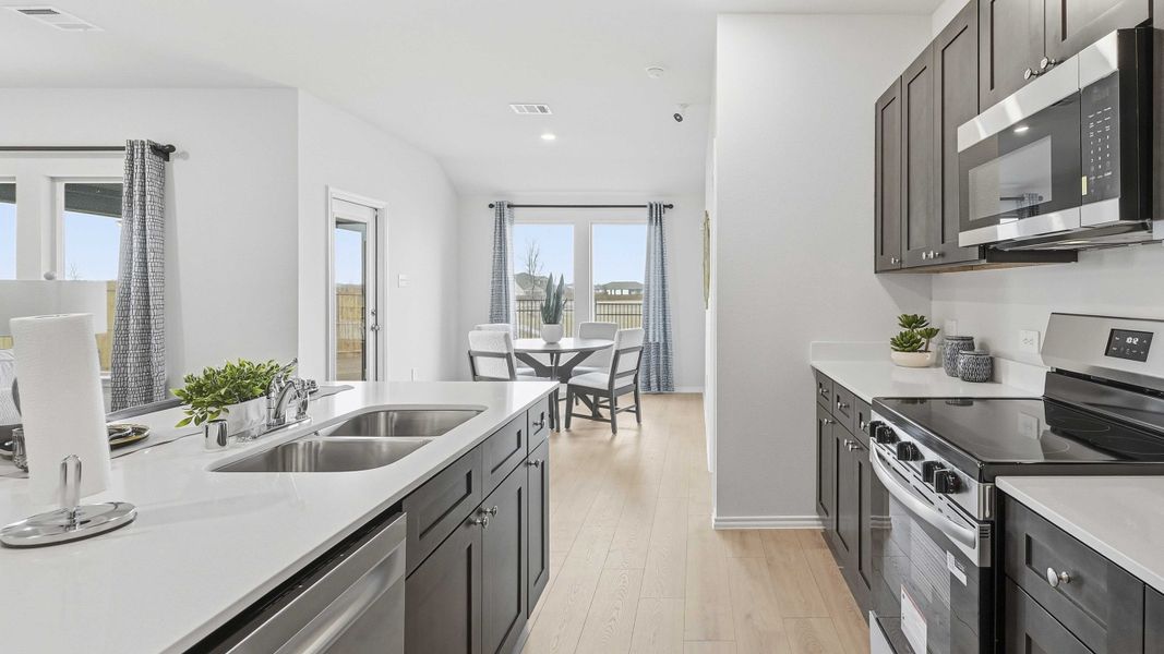 Furnished interior in a model home at Northspur in Terrell (Image 6).