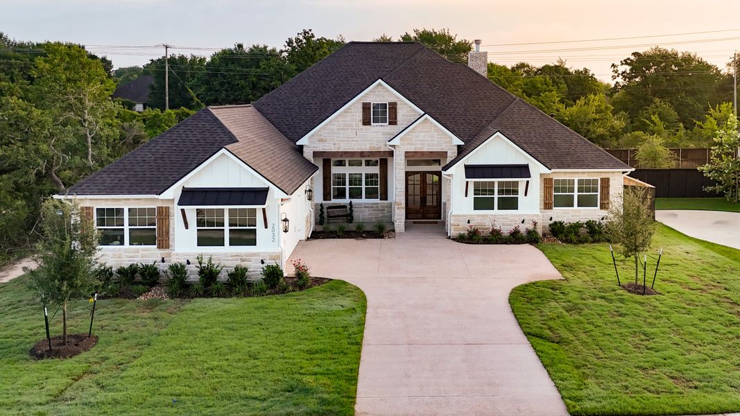 Front exterior of a home in the Pebble Creek community, located in College Station, TX (Image 11). Front exterior of a home in the Pebble Creek community, located in College Station, TX (Image 11).