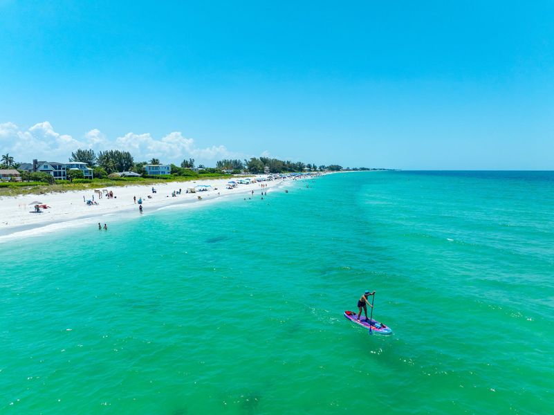 Anna Maria Island is a seven-mile-long barrier island on Florida’s Gulf Coast, located about 22 miles from Woodland Preserve.