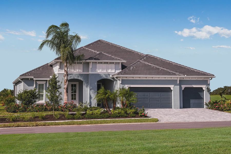 Front exterior of a home in the Grand Park community, located in Sarasota, FL (Image 15).