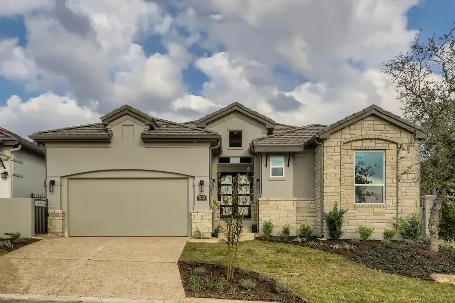 Front exterior of a home in the The Bluff At The Dominion community, located in Shavano Park, TX (Image 5).