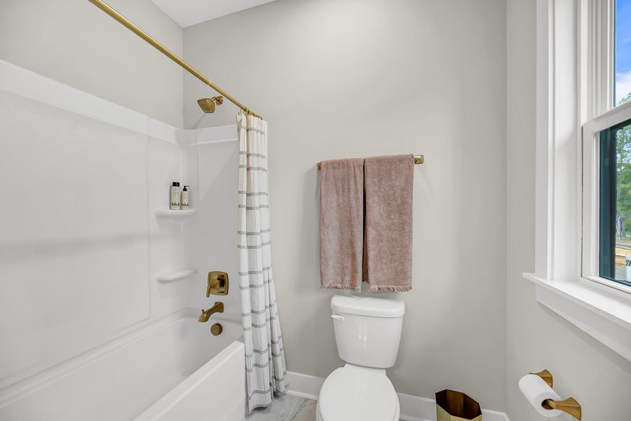 Furnished interior in a model home at Indigo Place in North Charleston (Image 7).