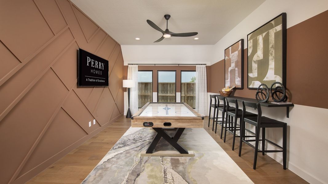 Furnished interior in a model home at Riceland 70' in Mont Belvieu (Image 16).