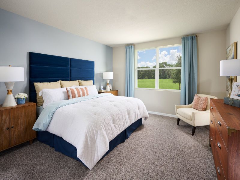 Furnished interior in a model home at The Reserve at Van Oaks in Auburndale (Image 8).