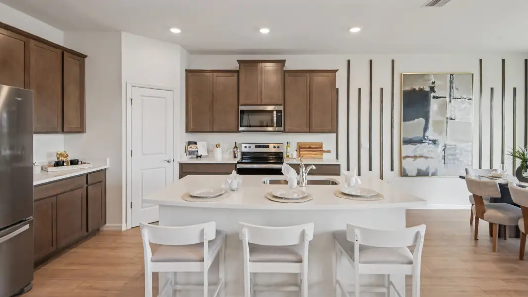 Furnished interior in a model home at Briarwood in Alachua (Image 3).
