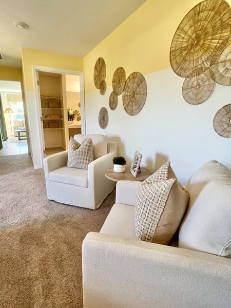 Furnished interior in a model home at Richmond Cove in Palm Bay (Image 34).
