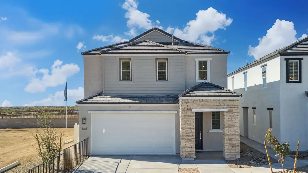 Front exterior of a home in the The Buttes at Mystic community, located in Peoria, AZ (Image 4). Front exterior of a home in the The Buttes at Mystic community, located in Peoria, AZ (Image 4).