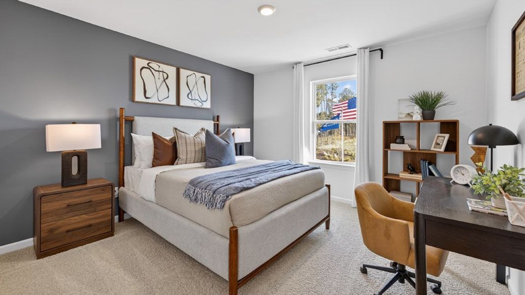 Furnished interior in a model home at The Landing at Winston Pointe in Clayton (Image 30). Furnished interior in a model home at The Landing at Winston Pointe in Clayton (Image 30).