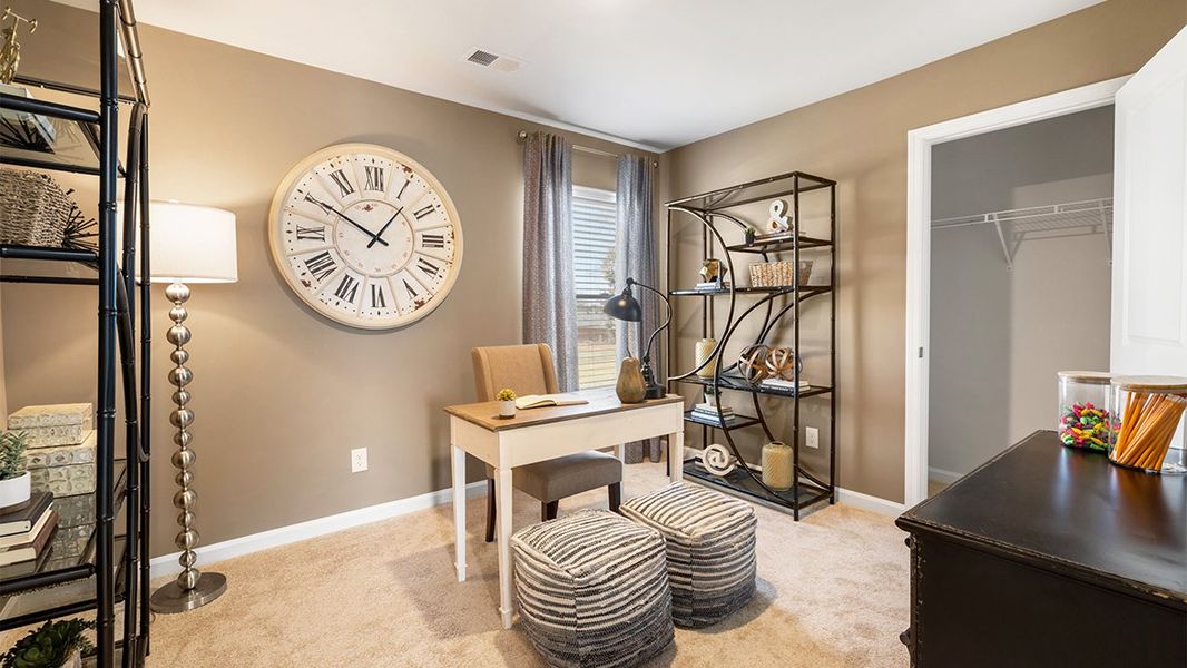 Furnished interior in a model home at Captain's Corner in Grovetown (Image 18).