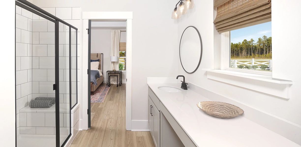 Furnished interior in a model home at Tea Farm: Presidents Series in Ravenel (Image 8).