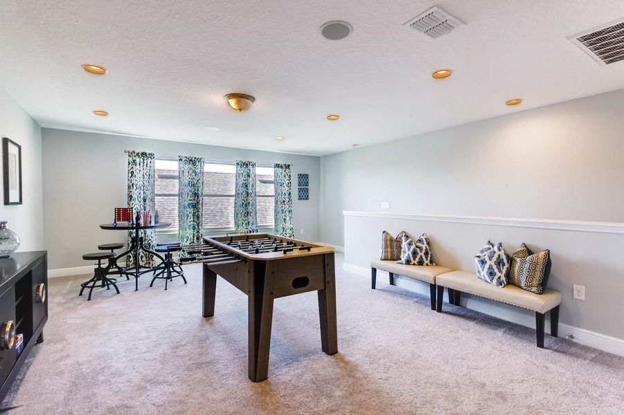 Furnished interior in a model home at Waterleigh in Winter Garden (Image 43).