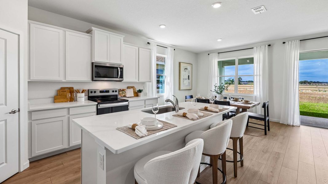 Furnished interior in a model home at Mockingbird Reserve at Winding Oaks in Ocala (Image 8).