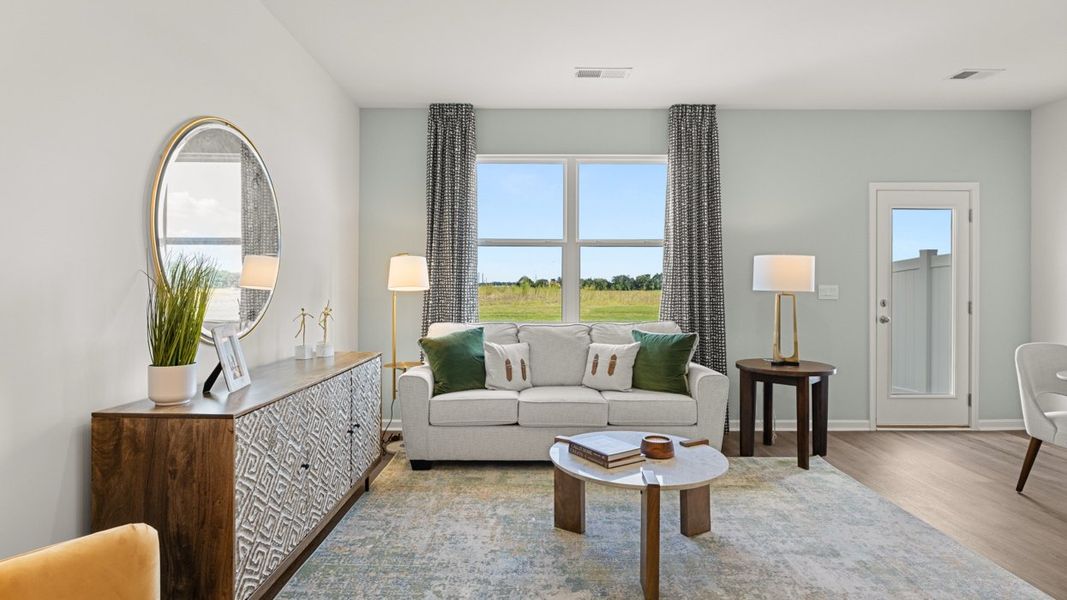 Furnished interior in a model home at The Gables at Agricultural Village in Perry (Image 16).