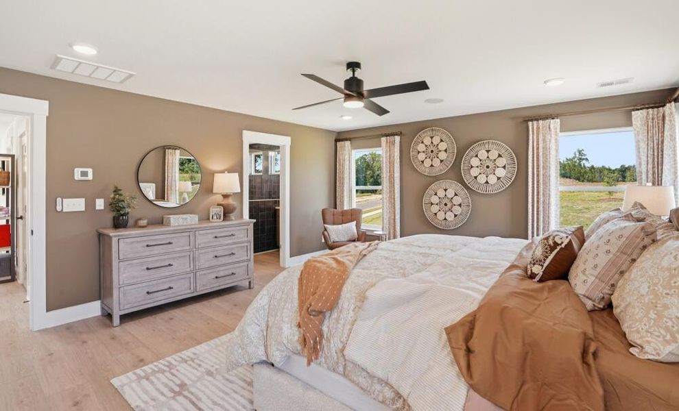 Furnished interior in a model home at Enclave at Riverdale in Huntersville (Image 22). Furnished interior in a model home at Enclave at Riverdale in Huntersville (Image 22).