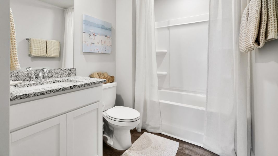 Furnished interior in a model home at Saltgrass Landing in Winnabow (Image 15).