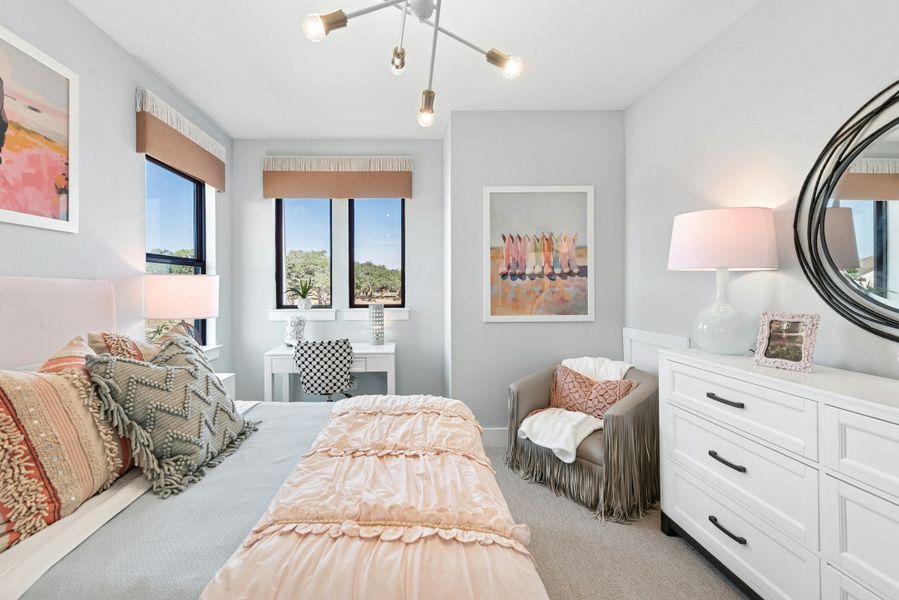 Furnished interior in a model home at Caliterra in Dripping Springs (Image 64).