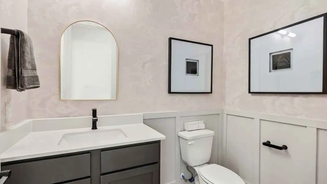 Furnished interior in a model home at The Ridge at Tamarron in Fulshear (Image 11).