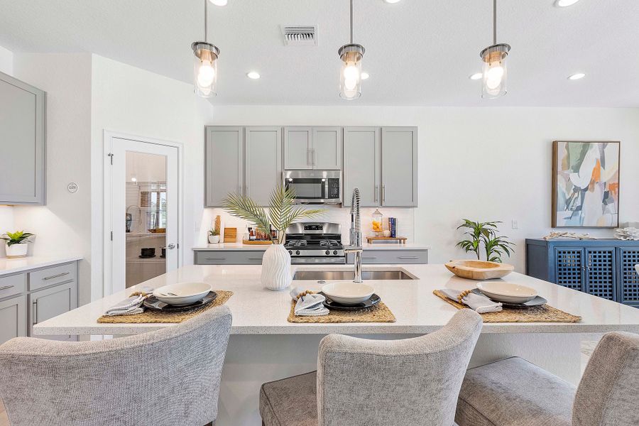 Furnished interior in a model home at The Sanctuary – Coastal Collection in Punta Gorda (Image 35).