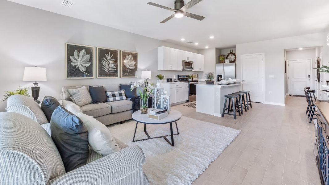 Furnished interior in a model home at Asher Park in Lehigh Acres (Image 13).