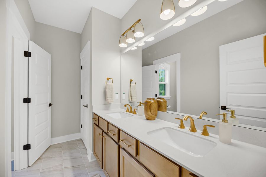 Furnished interior in a model home at Indigo Place in North Charleston (Image 9).