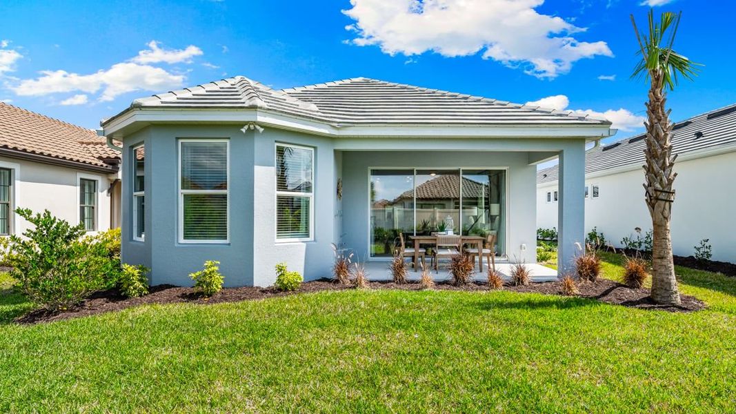 Front exterior of a home in the Esplanade at Wiregrass Ranch community, located in Wesley Chapel, FL (Image 19).