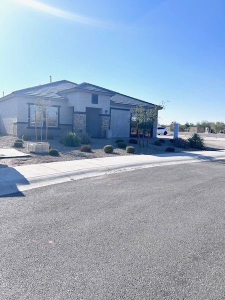 A modern home with a desert landscape in Village at Sundance by Centex (Buckeye, AZ). A modern home with a desert landscape in Village at Sundance by Centex (Buckeye, AZ).