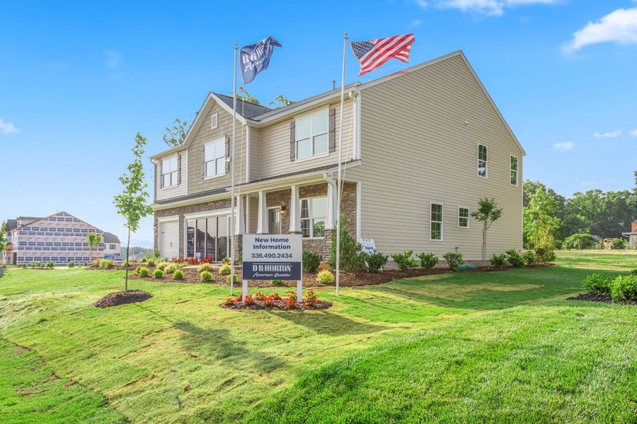 Front exterior of a home in the Cedar Oaks community, located in Greensboro, NC (Image 2).