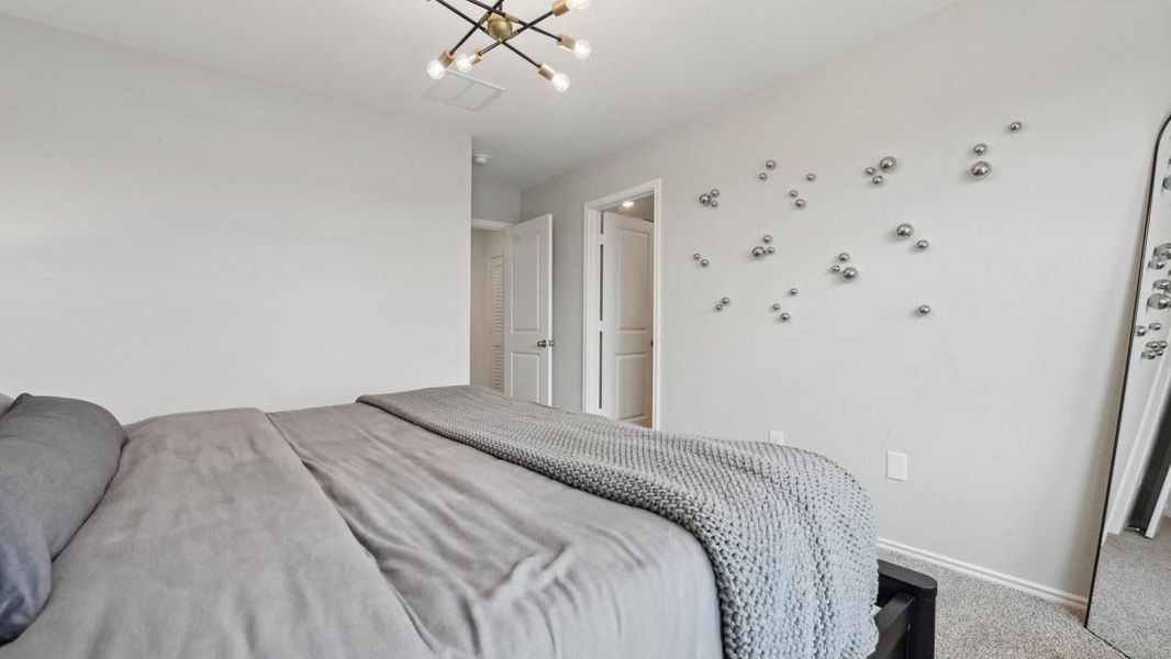 Furnished interior in a model home at The Villas at Legacy Park in Houston (Image 17).