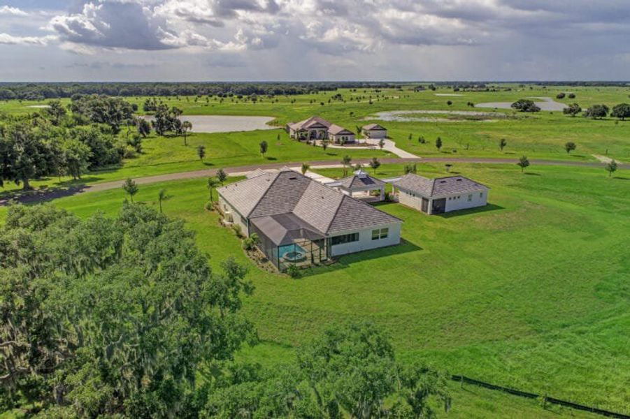Aerial view of the Hampton Lakes community in Sarasota, FL, showing layout and nearby surroundings (Image 27). Aerial view of the Hampton Lakes community in Sarasota, FL, showing layout and nearby surroundings (Image 27).