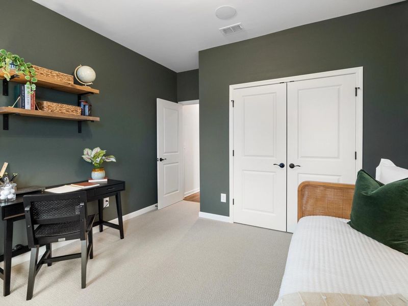 Furnished interior in a model home at Kelly Preserve in Loganville (Image 10).