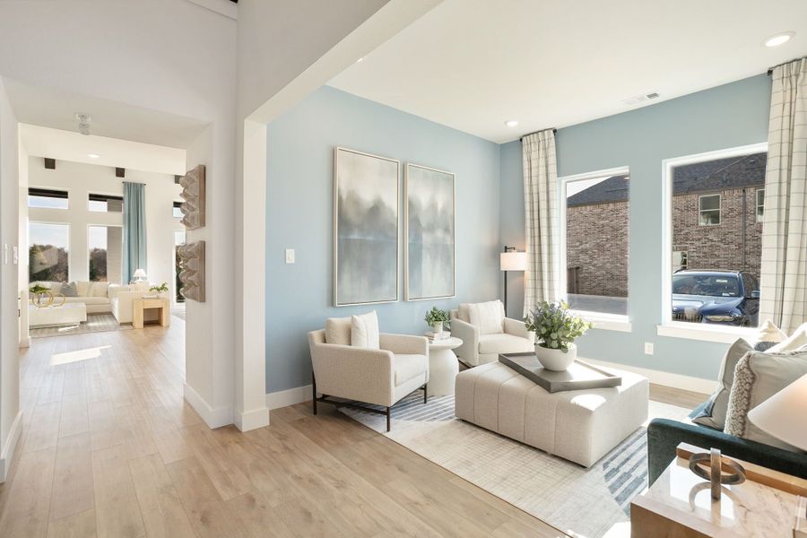 Furnished interior in a model home at Lily Creek at Sutton Fields in Aubrey (Image 103).