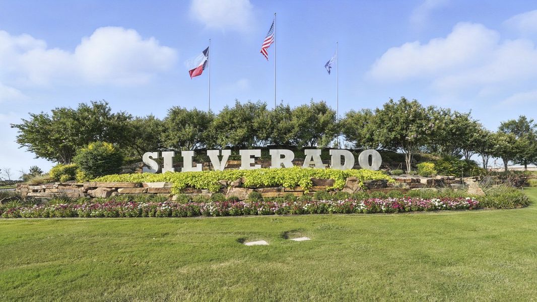 Entrance to the Silverado community in Aubrey, TX, featuring signage and landscaping (Image 1).
