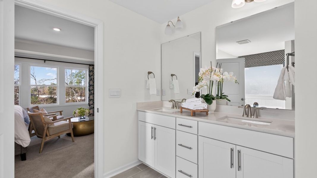 Furnished interior in a model home at The Grove at Winston Pointe in Clayton (Image 29).