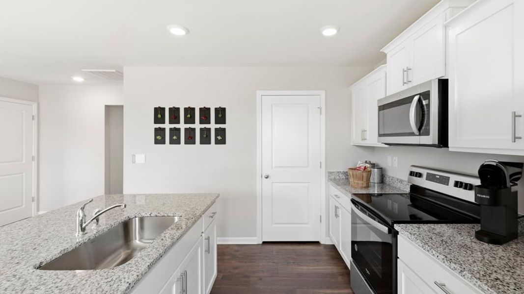 Furnished interior in a model home at Treemont Commons in Wellford (Image 21).