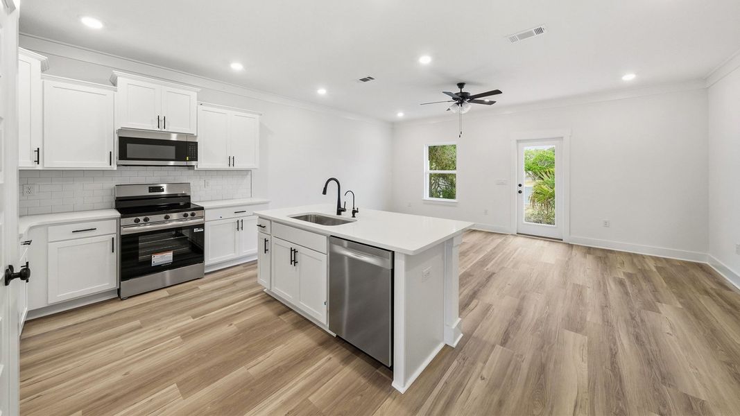 Furnished interior in a model home at Palm Street Townhomes in Destin (Image 9).