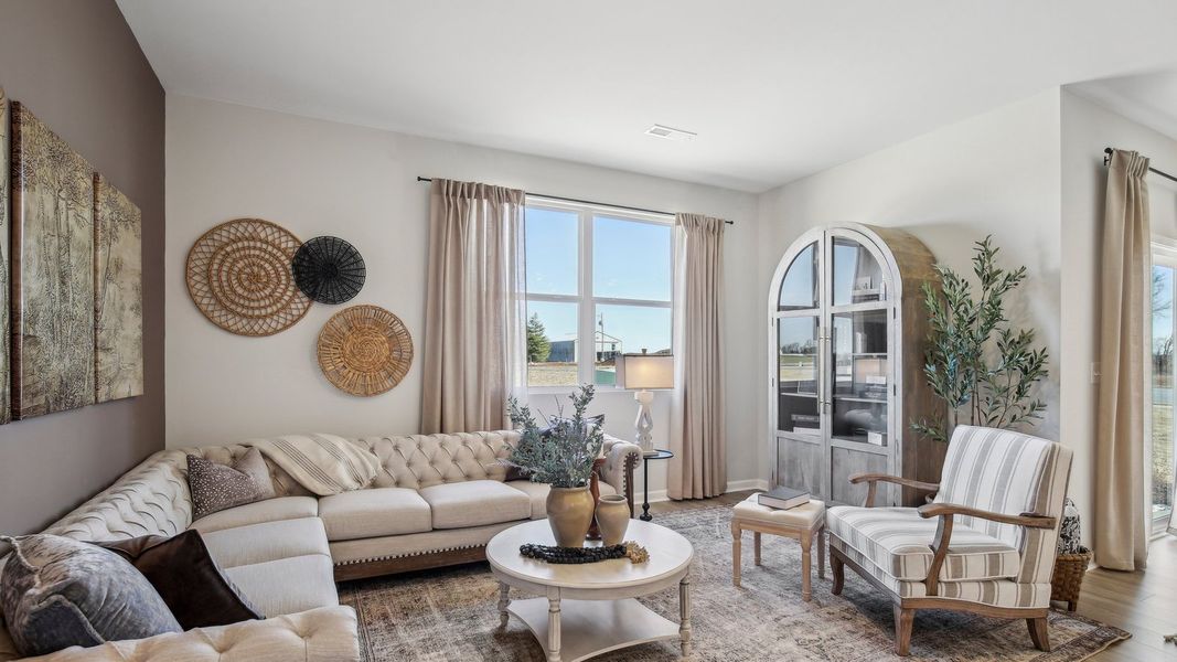 Furnished interior in a model home at CDJ Farms in Portland (Image 9).