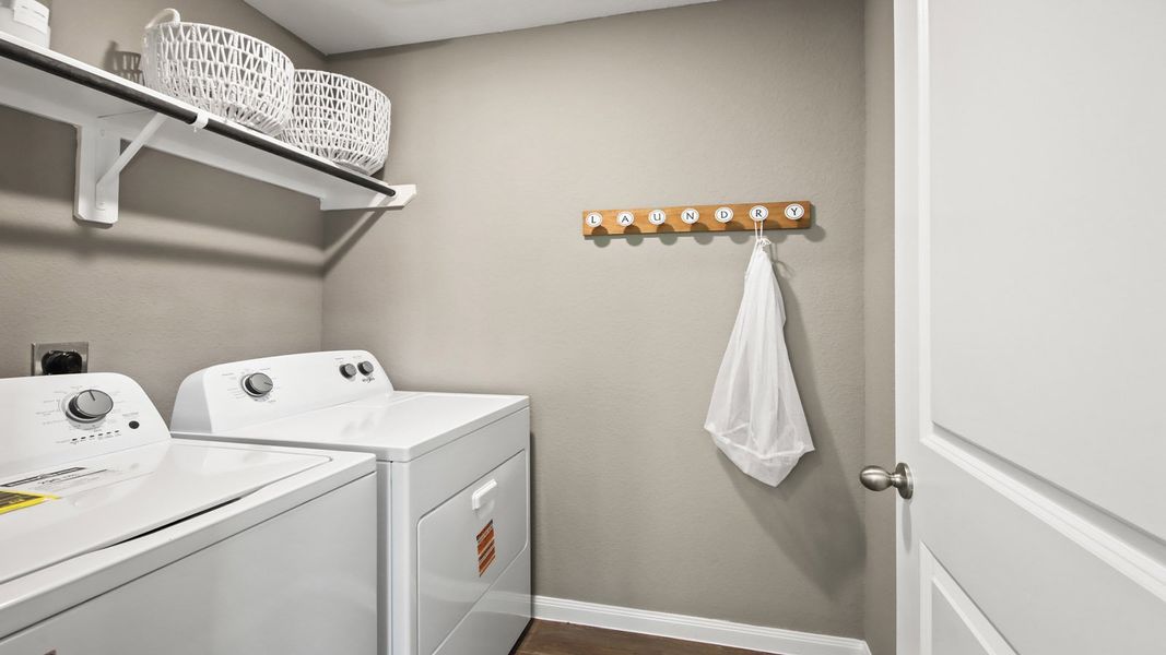 Furnished interior in a model home at Castles Edge in Willis (Image 7).