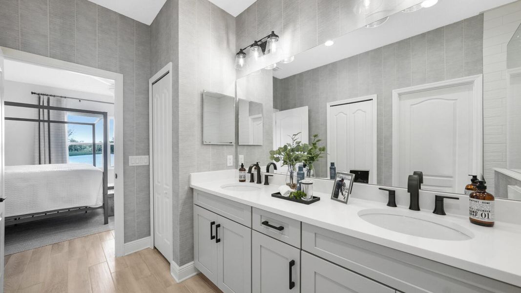 Furnished interior in a model home at Wildleaf at North River Ranch in Parrish (Image 10).