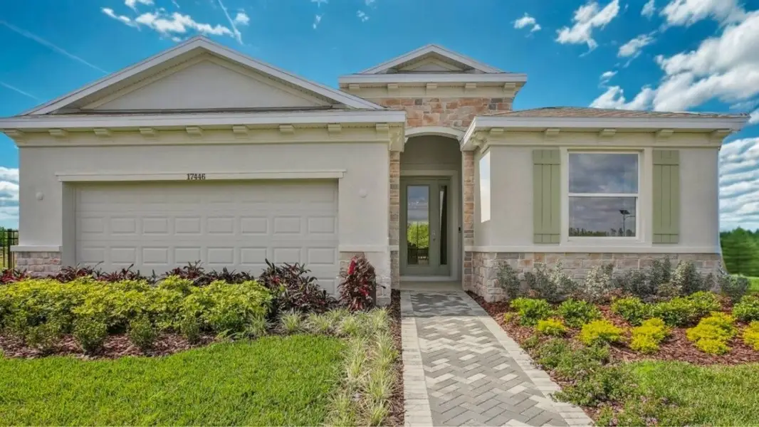 Front exterior of a home in the Angeline community, located in Land O' Lakes, FL (Image 3). Front exterior of a home in the Angeline community, located in Land O' Lakes, FL (Image 3).