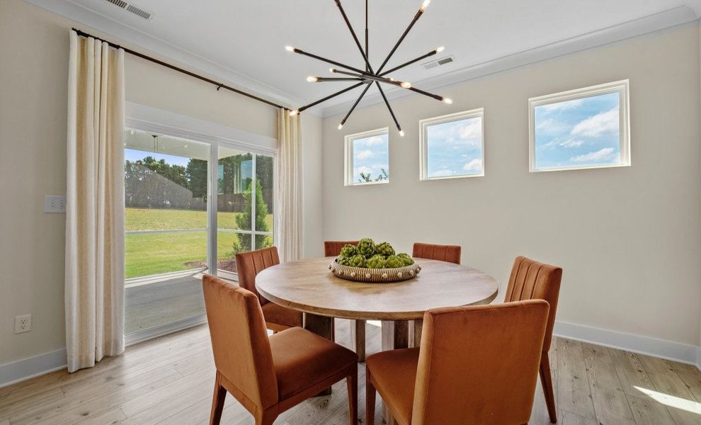 Furnished interior in a model home at Grove Park in Clemmons (Image 4).