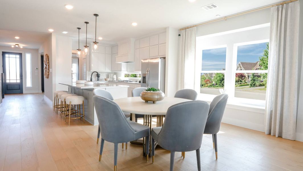 Furnished interior in a model home at Villages of Creekwood in Frisco (Image 3).