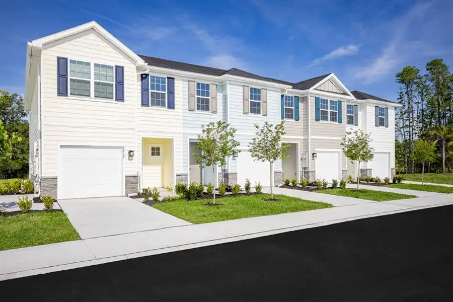 Front exterior of a home in the Timbergrove community, located in Lutz, FL (Image 1).