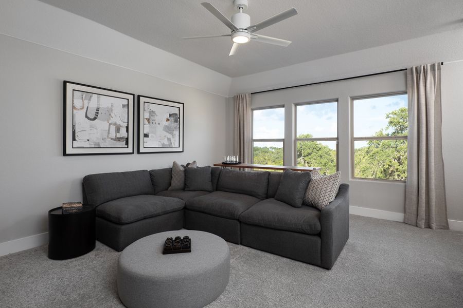 Furnished interior in a model home at Megan's Landing 50's in Castroville (Image 6).